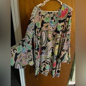 Stunning and very flattering knee length dress, flared sleeves.